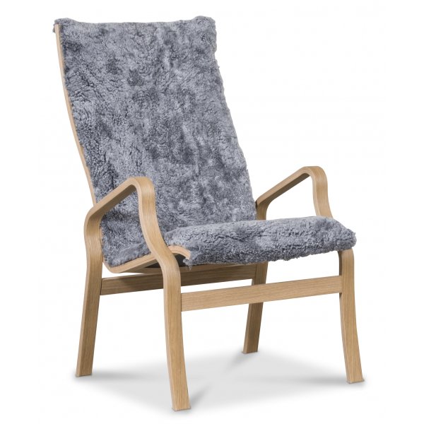 Svea lenestol med fotskammel - Gr�tt f�reskinn / oljet eik